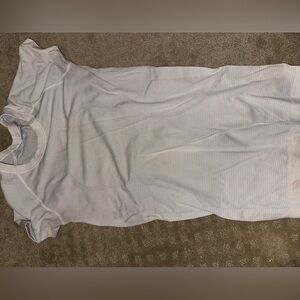 White lulu top small light colored stain at top